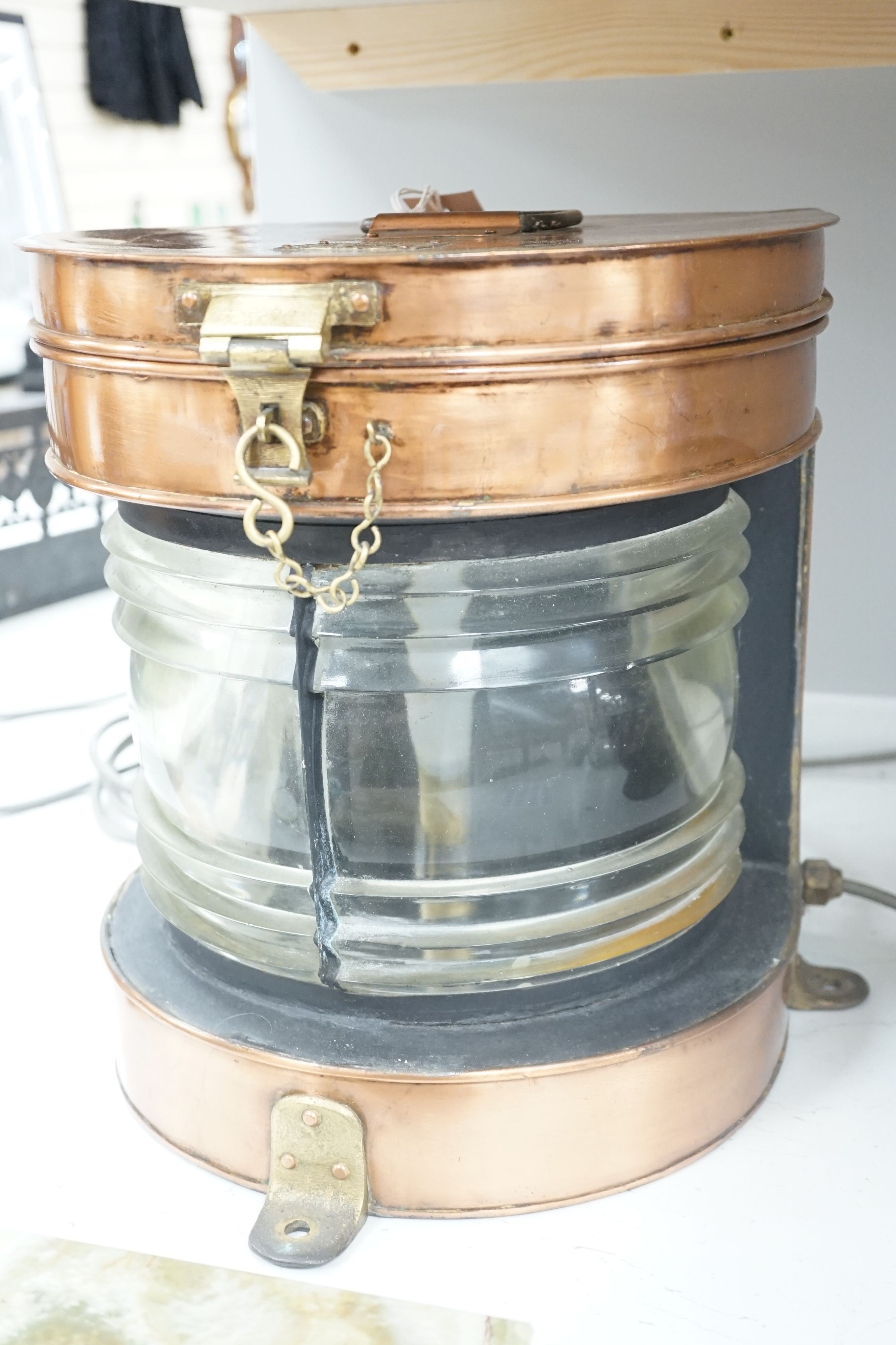A large ‘Seahorse’ trade mark copper ship's lantern, serial number 27727, 34cm tall